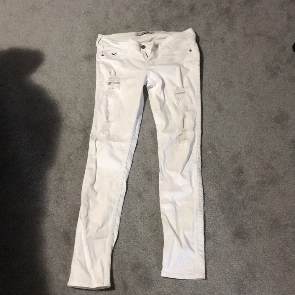 Distressed white jeans